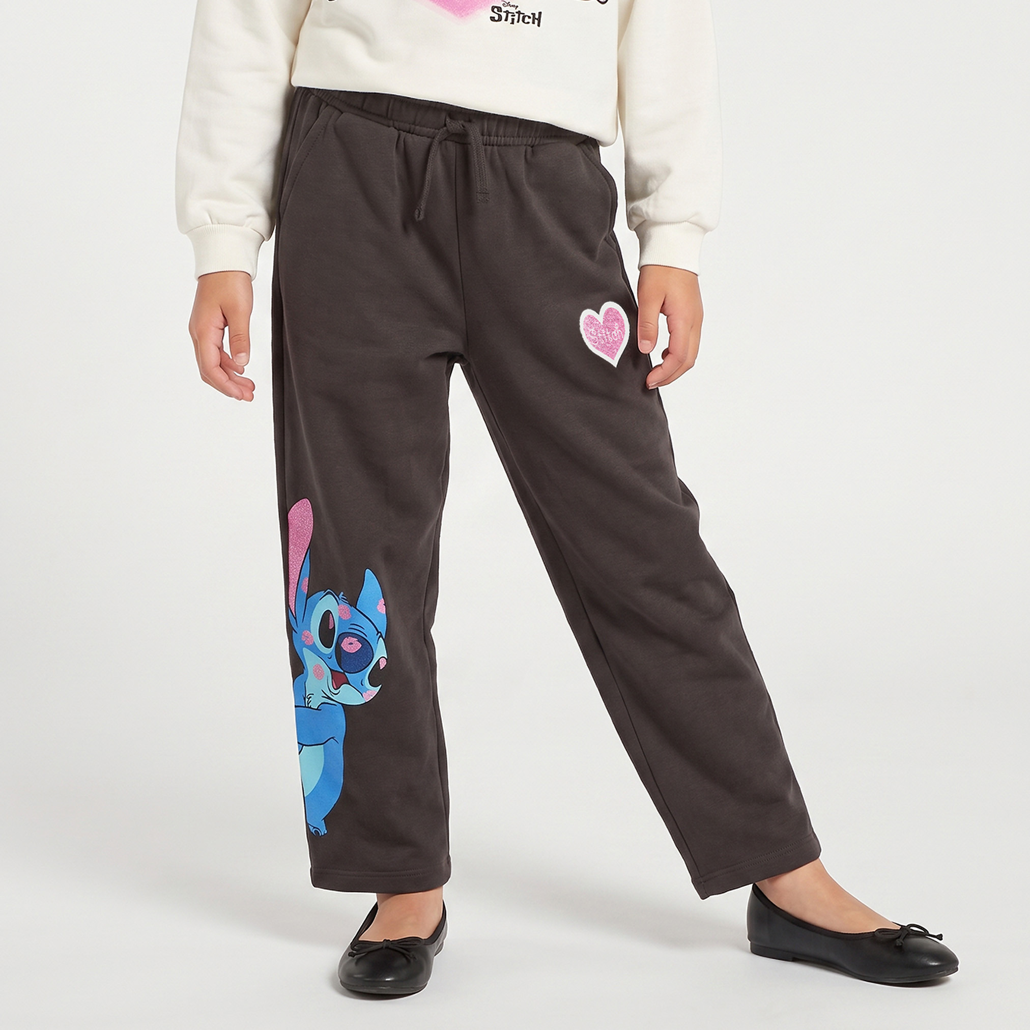 بنطلون رياضي بخصر مطاطي ورباط وطبعات ستيتش من ديزني-girls-clothing-bottoms-joggersandtrackpants-image-1