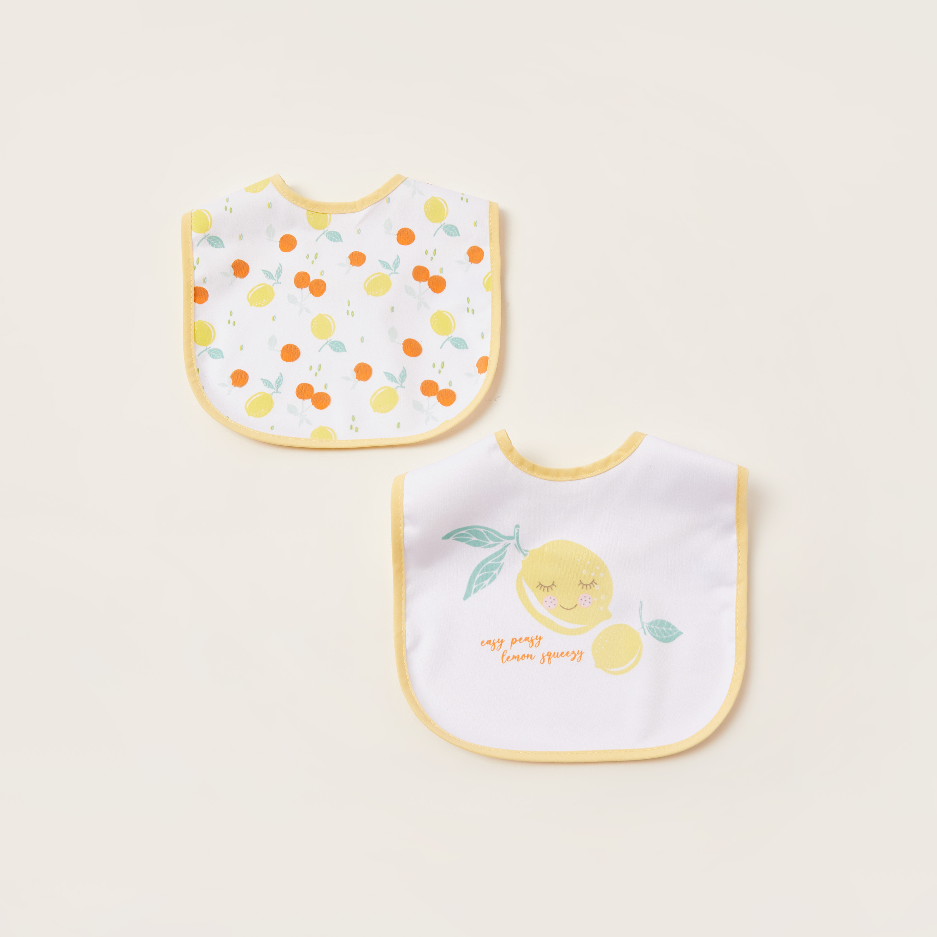 مرايل بطبعات وشريط إغلاق من جونيورز - طقم من قطعتين-baby-feeding-bibs-image-1