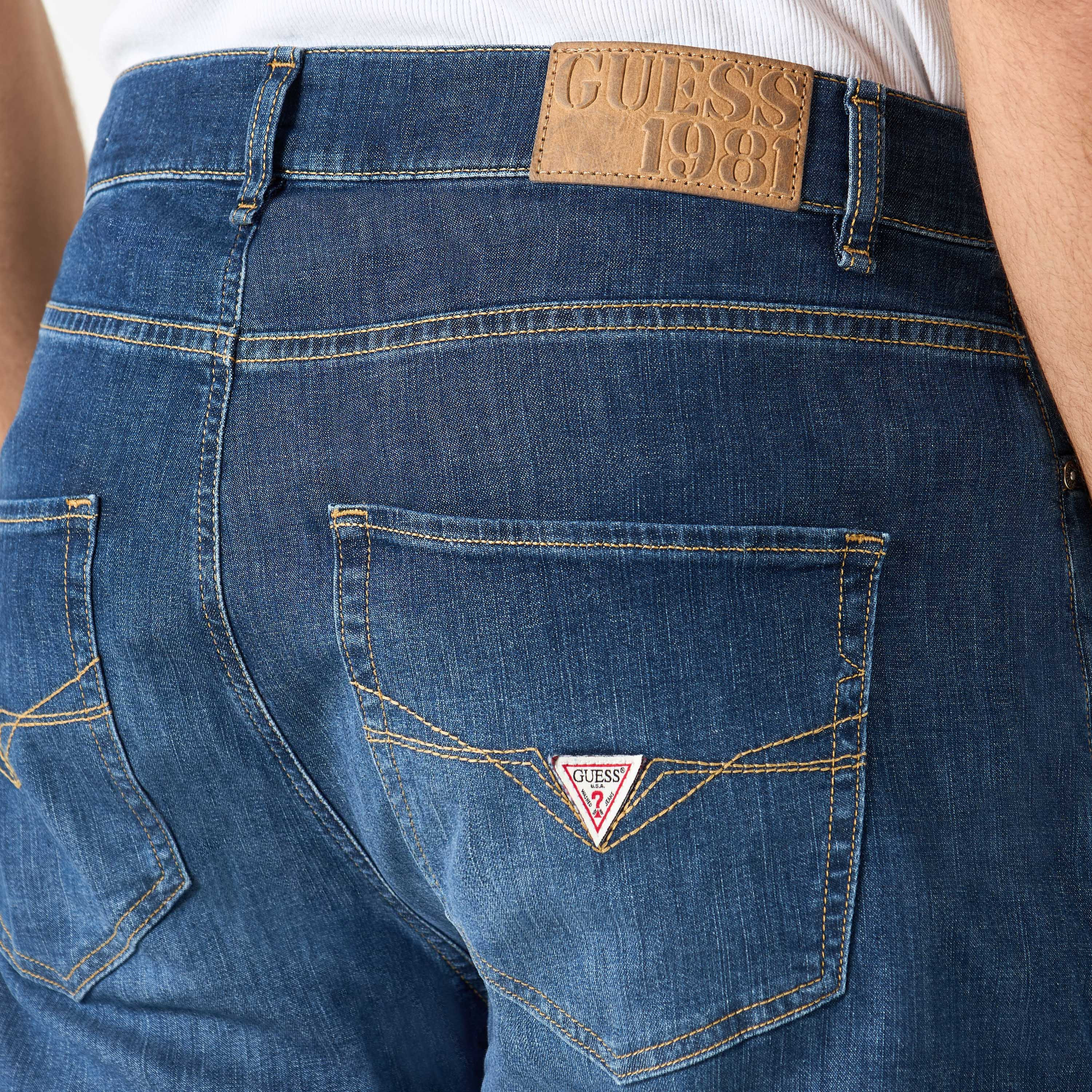 Guess Solid Relaxed Fit Jeans with Pockets-men-clothing-bottoms-jeans-image-4