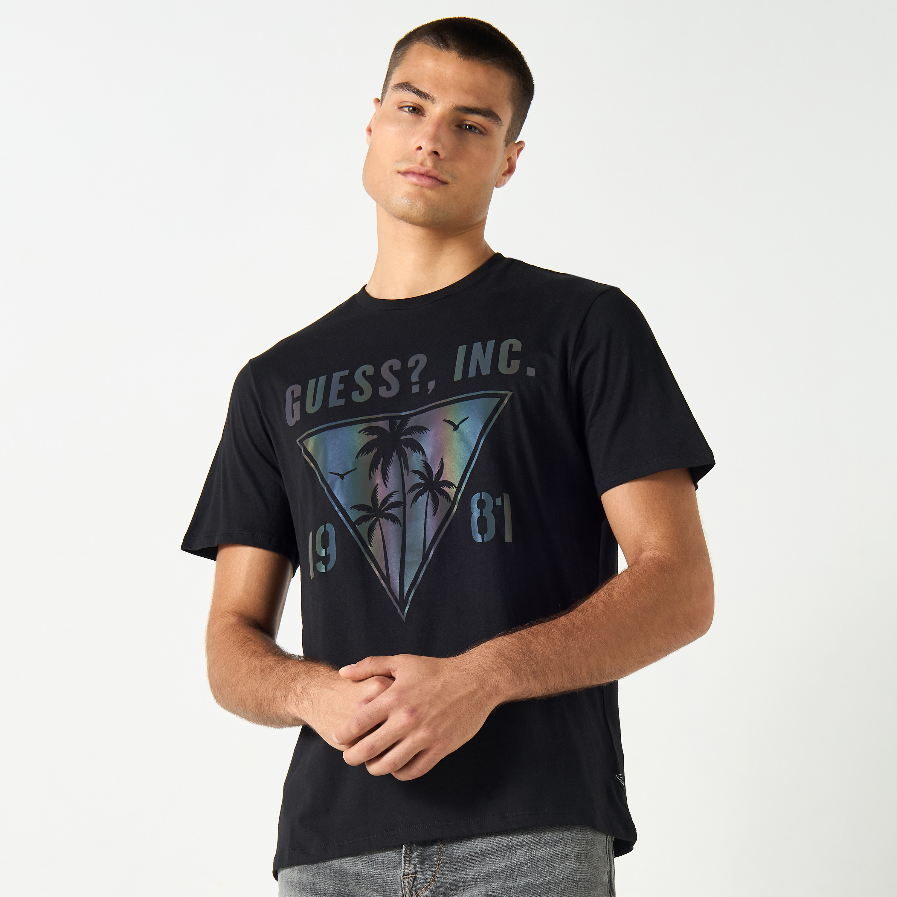 Buy Men s Guess Graphic Print Crew Neck T shirt with Short Sleeves Online Centrepoint Oman