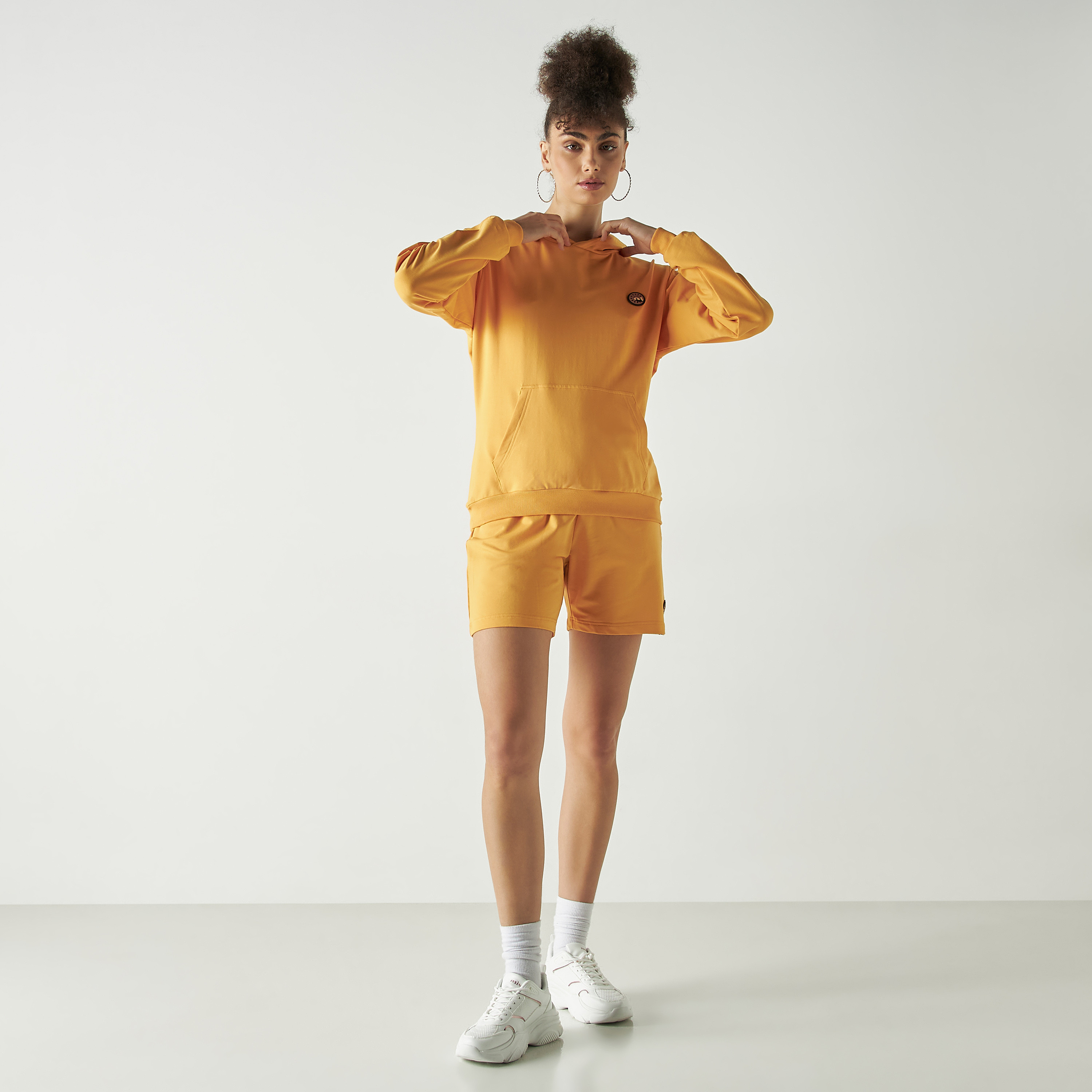 بدلة رياضية من شورتات وهودي كو-اوردز من بنجولين ستراتاتيك بلون أصفر-women-clothing-coordsets-image-1