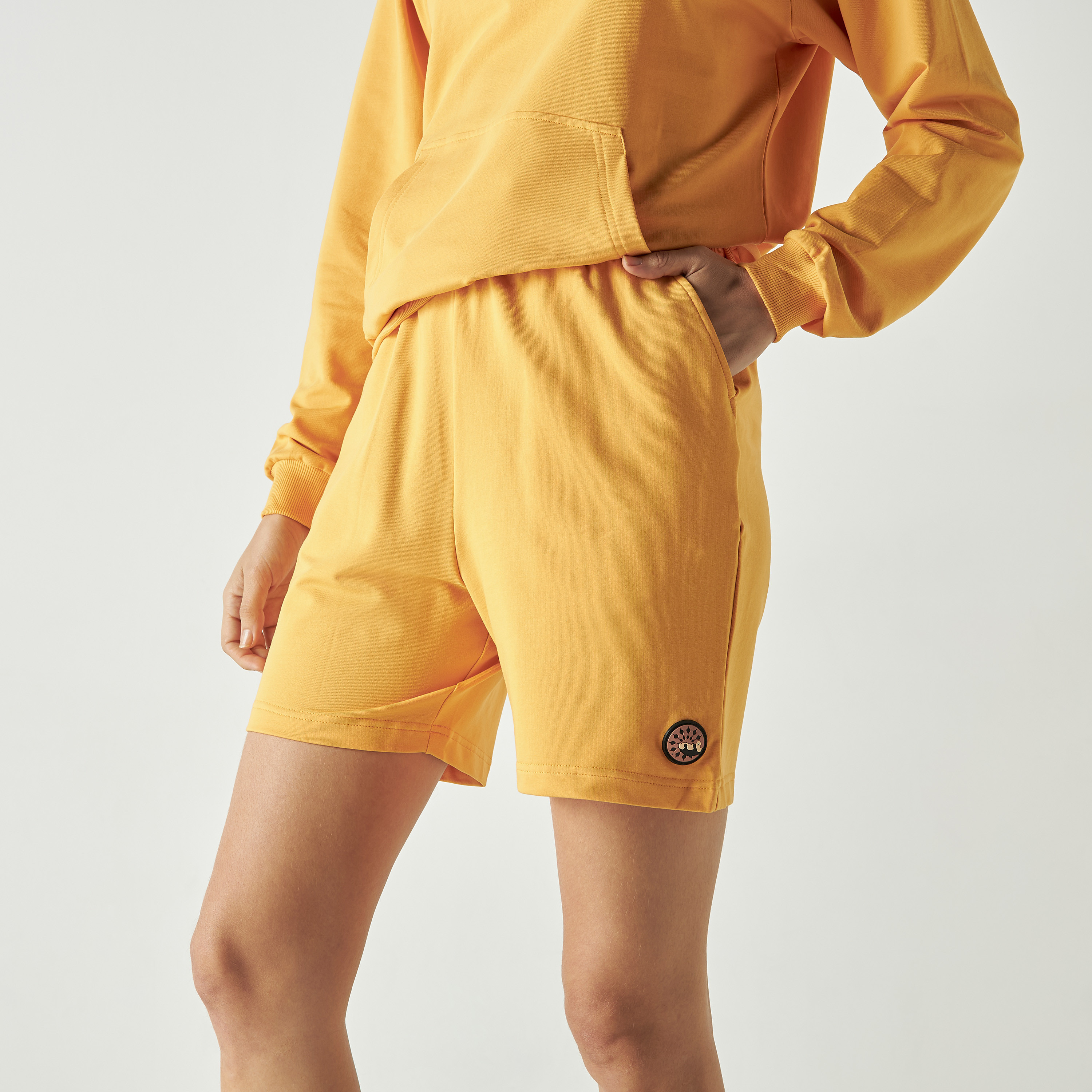 بدلة رياضية من شورتات وهودي كو-اوردز من بنجولين ستراتاتيك بلون أصفر-women-clothing-coordsets-image-4