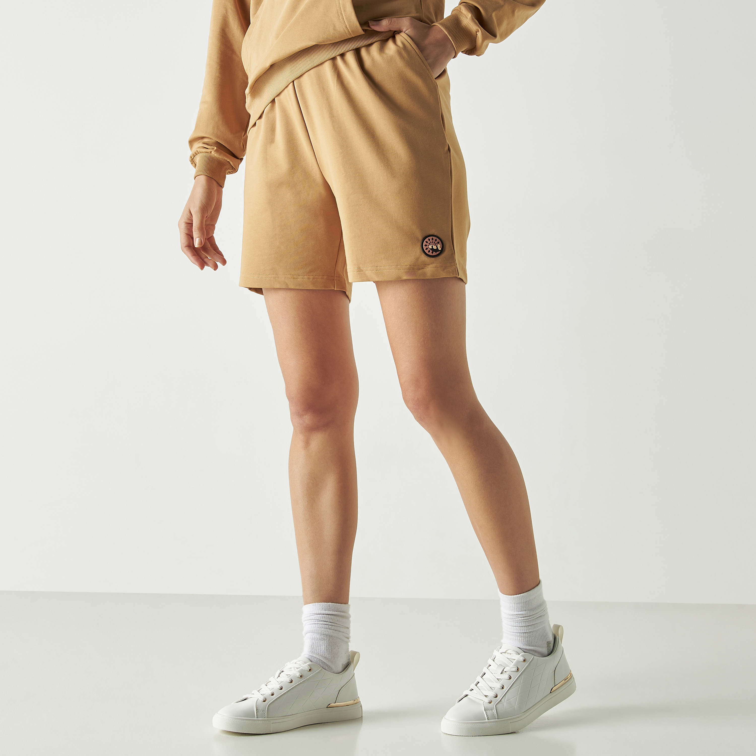 بدلة رياضية من شورتات وهودي كو-اوردز من بنجولين ستراتاتيك بلون أصفر-women-clothing-coordsets-image-11
