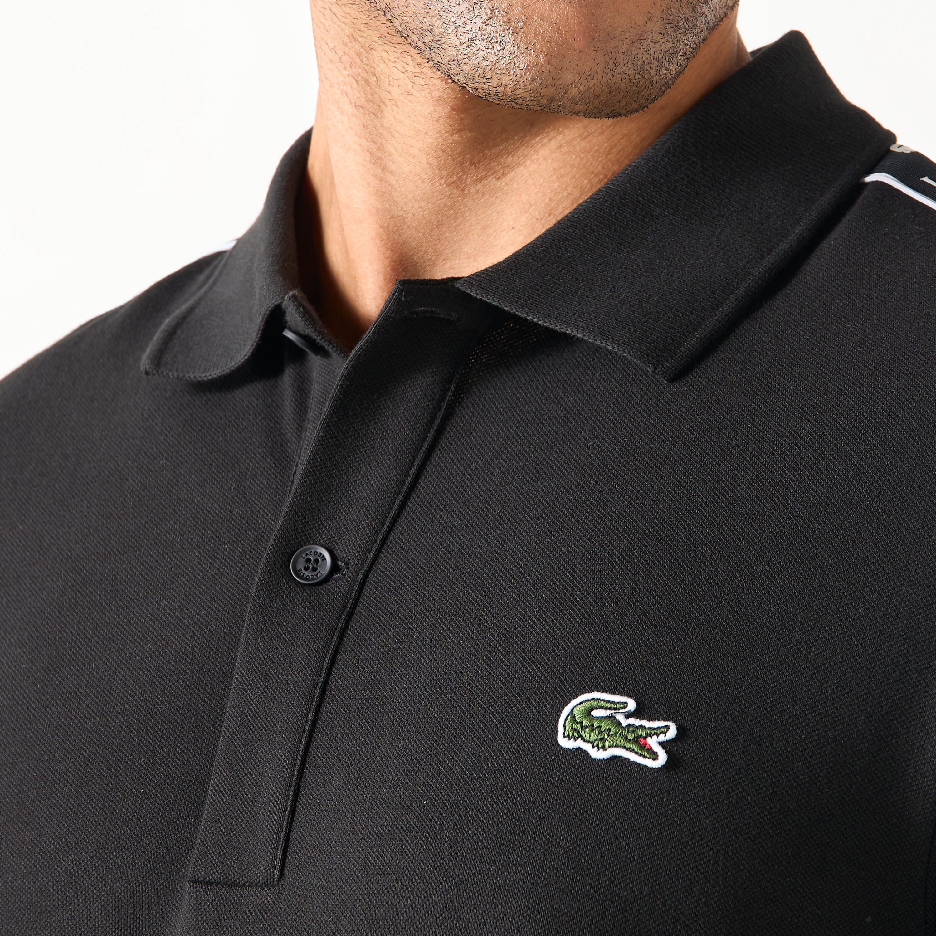 تيشيرت بولو بأكمام قصيرة وطبعات شعار من لاكوست-men-clothing-tshirtsandpolos-polos-image-4