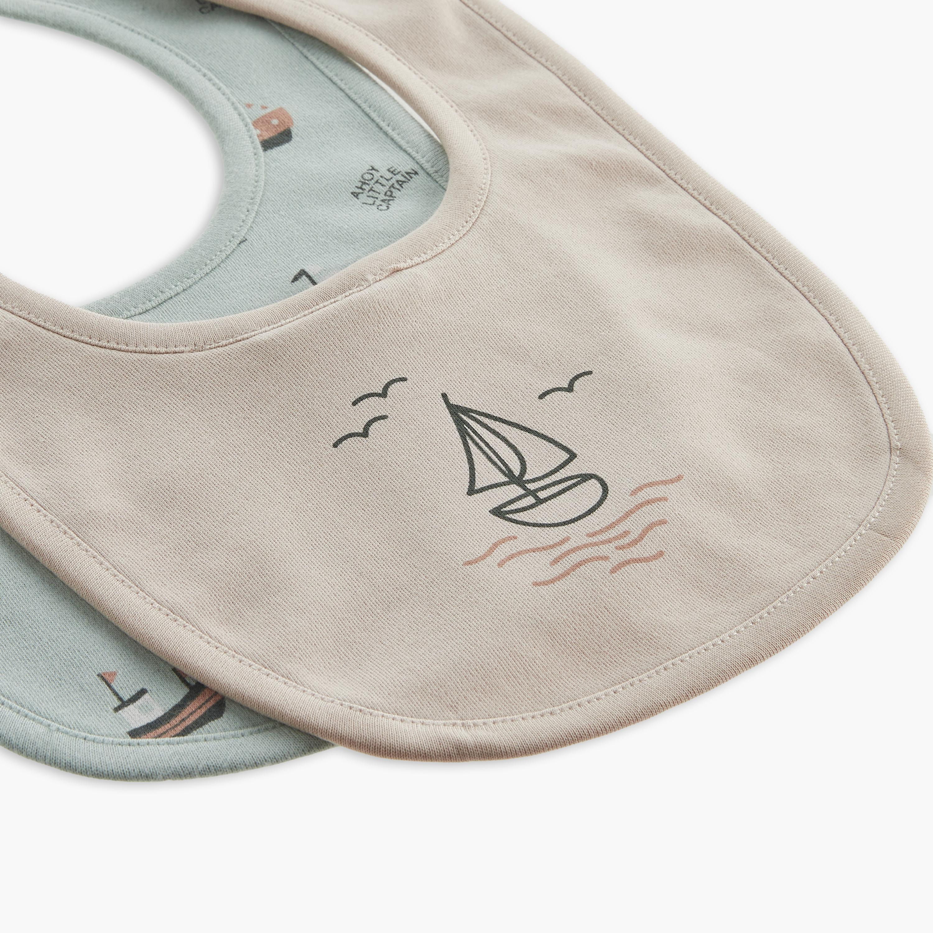 مريلة بطبعات قارب مع زر إغلاق كباس من جونيورز -  طقم من قطعتين-baby-feeding-bibs-image-4