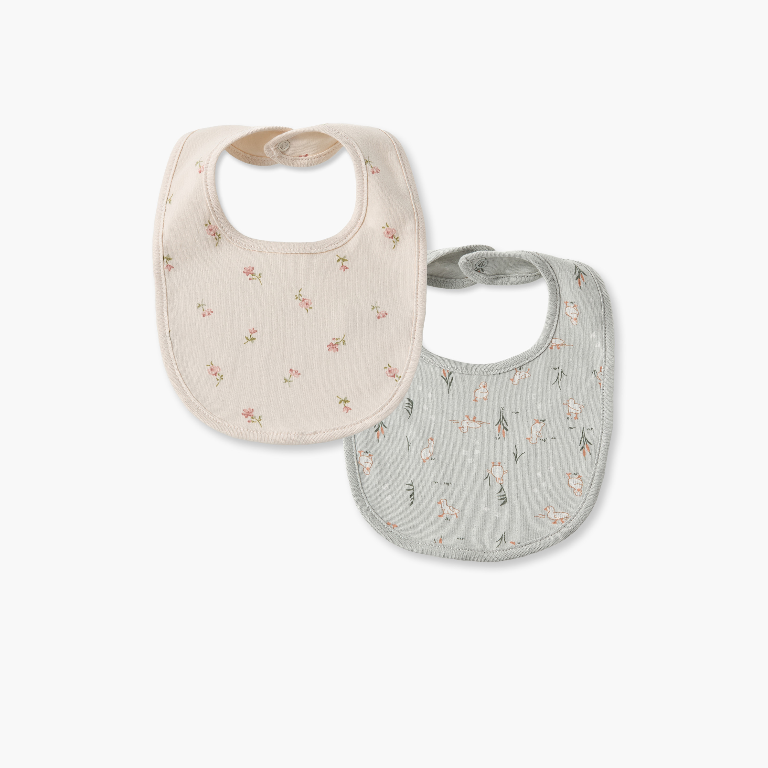 مرايل أطفال بطبعات نباتية من جونيورز - عبوة من قطعتين-baby-feeding-bibs-image-1