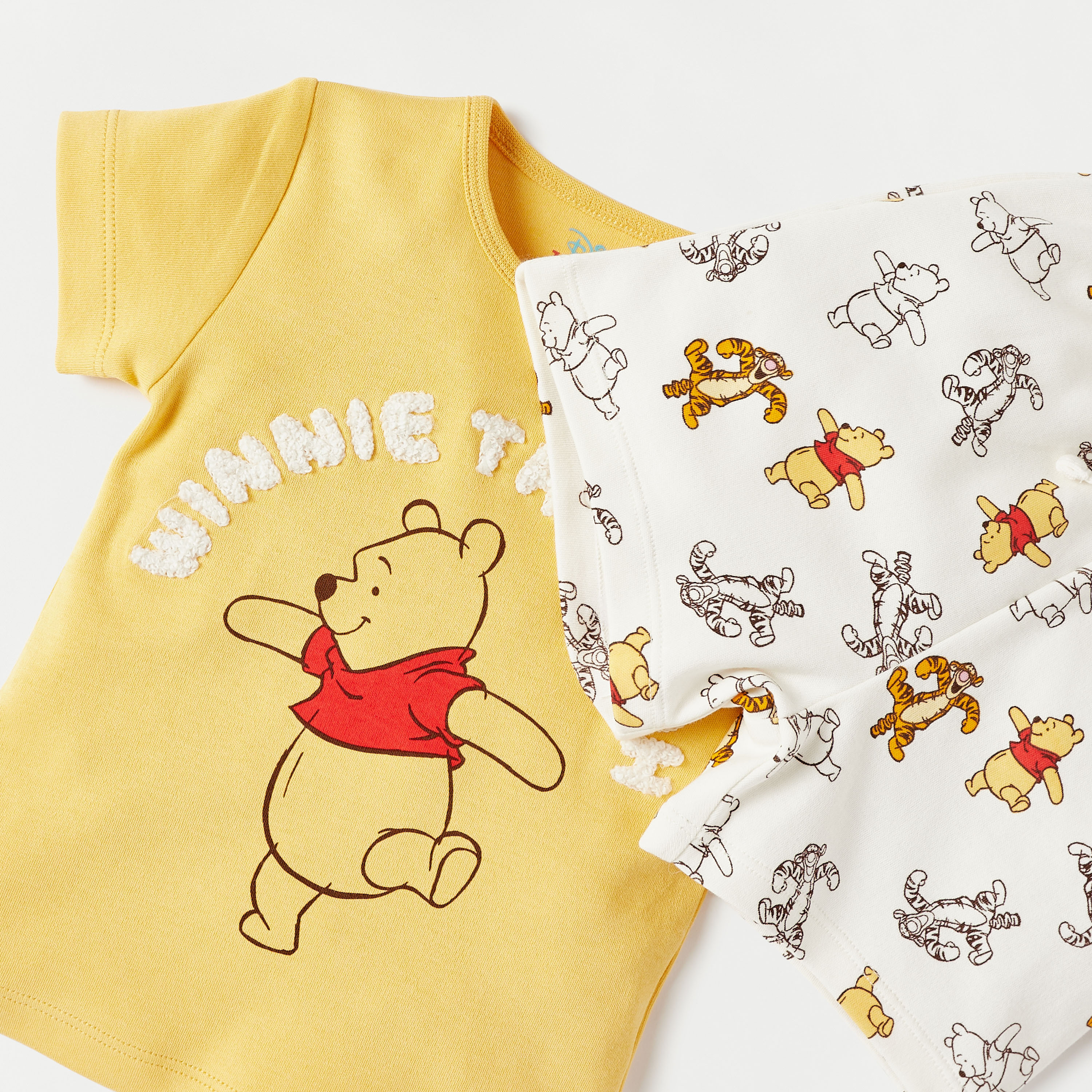 طقم شورت بخصر مطاطي وتيشيرت بطبعات ويني ذا بوه من ديزني-promo_babyshop_Buy3for99_OMN130126-image-5