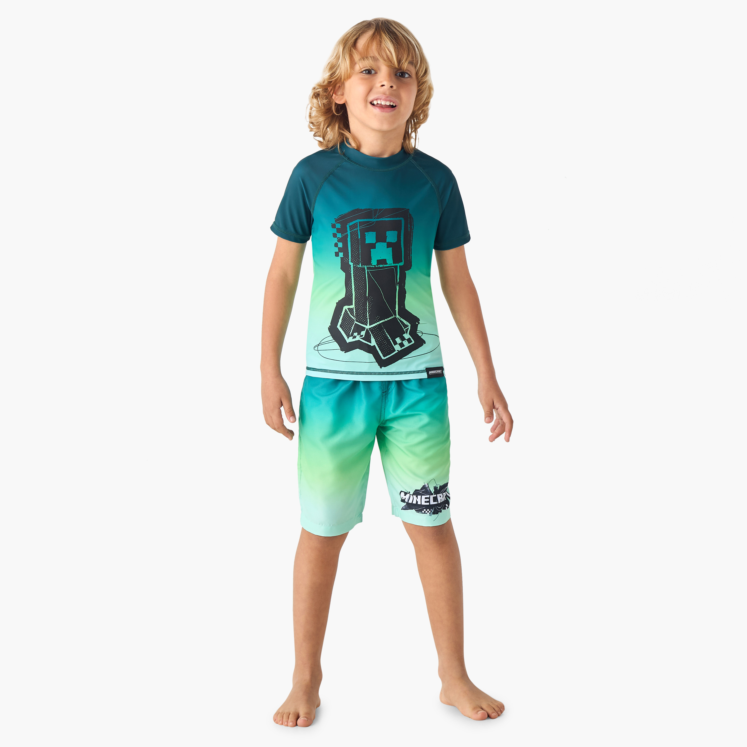 طقم تيشيرت وشورت سباحة بطبعات-boys-clothing-sportswear-swimwear-image-1
