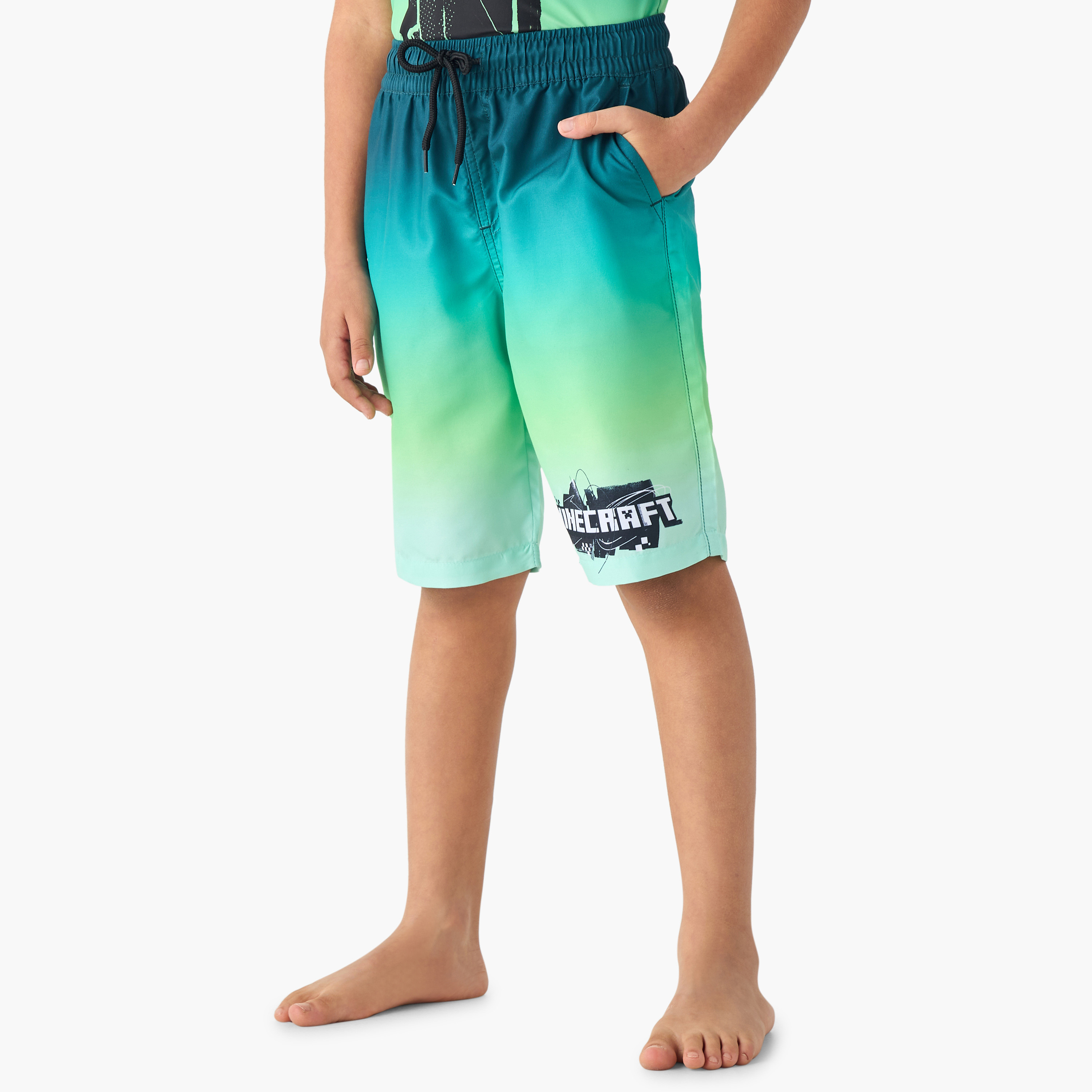 طقم تيشيرت وشورت سباحة بطبعات-boys-clothing-sportswear-swimwear-image-3