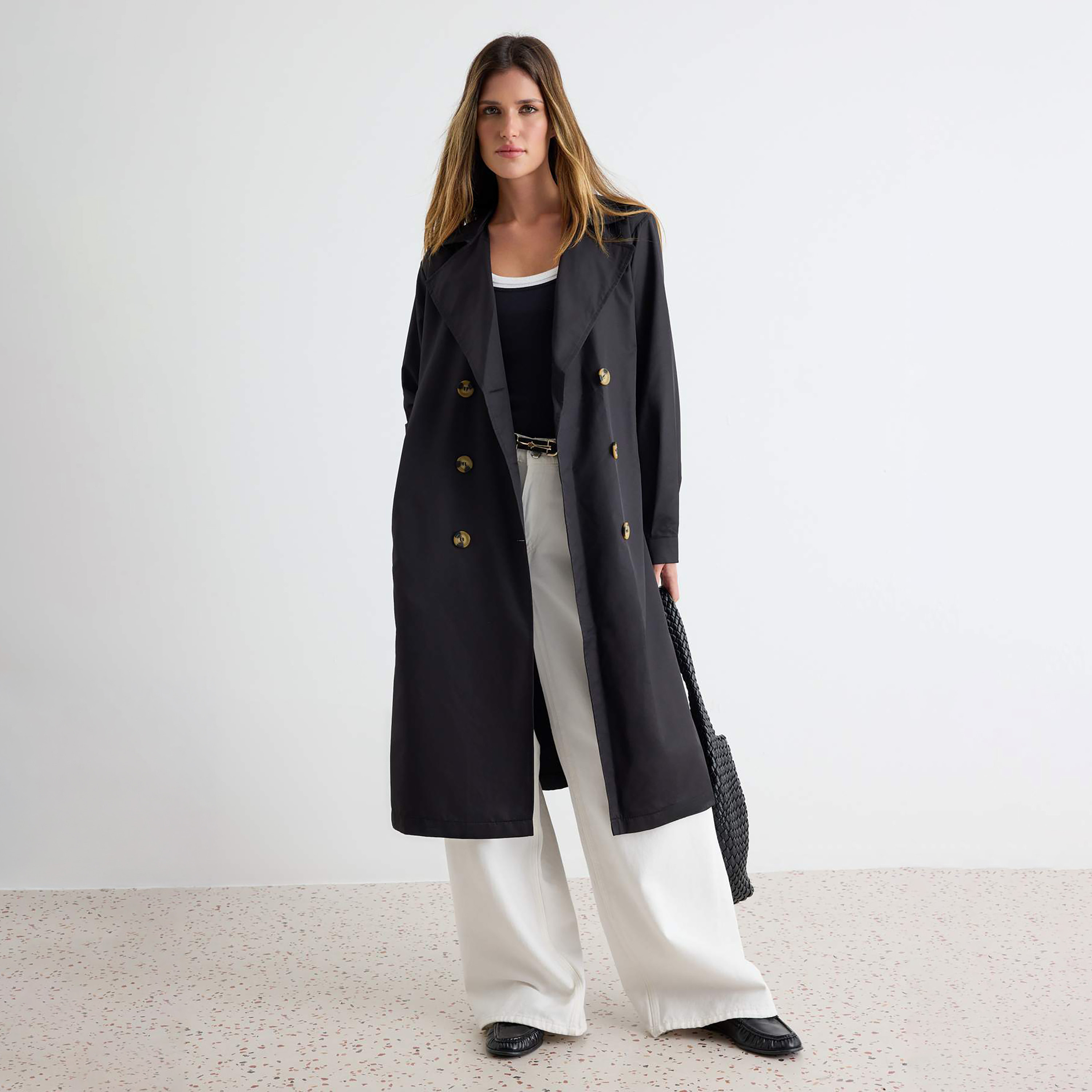 ترينش كوت حريمي بياقة مطوية وأكمام منتفخة من ترendyol-women-winterwear-coatsandjackets-coats-image-1