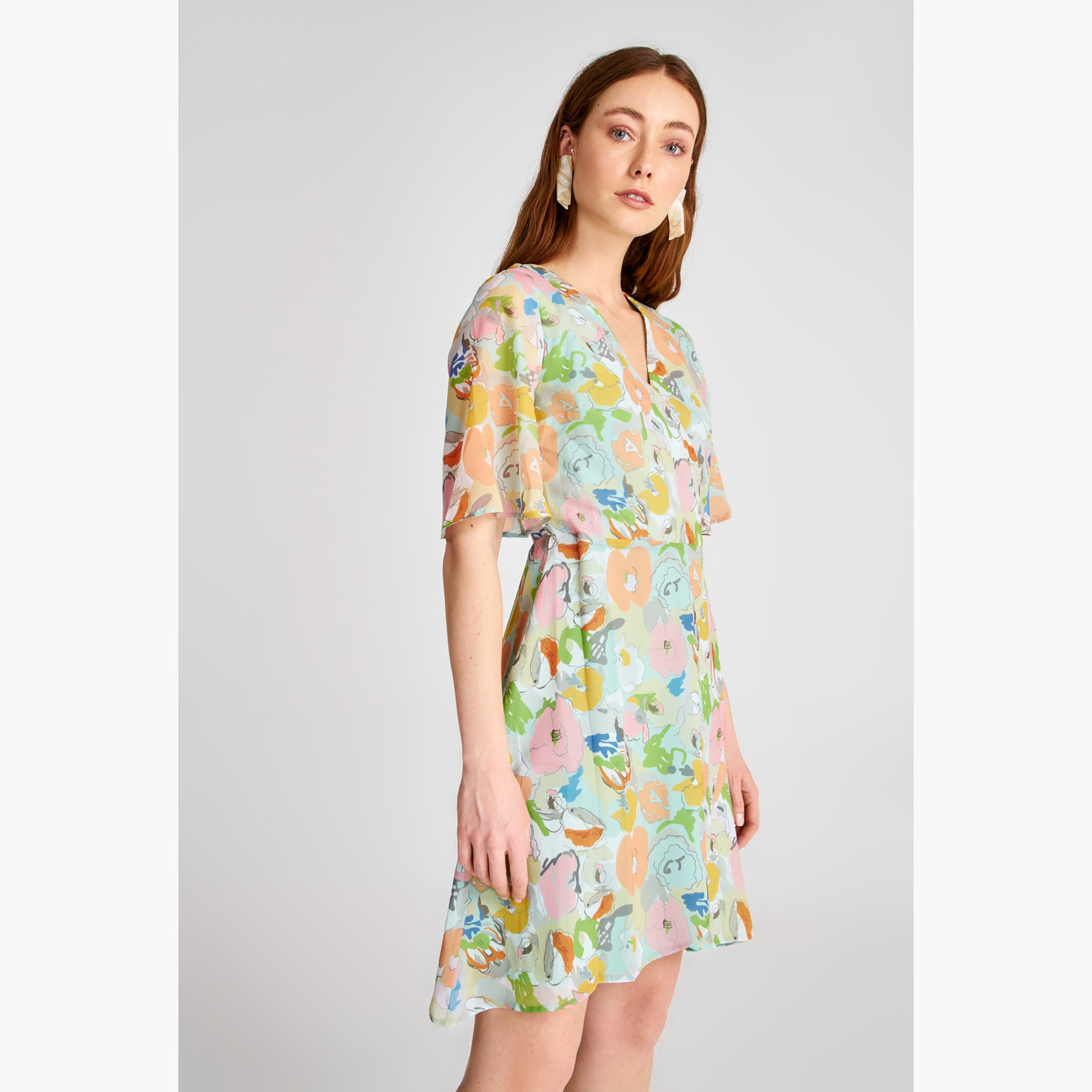 فستان قصير واسع بياقة V وأكمام قصيرة و طبعات أزهار من ترينديول-women-clothing-dresses-image-3