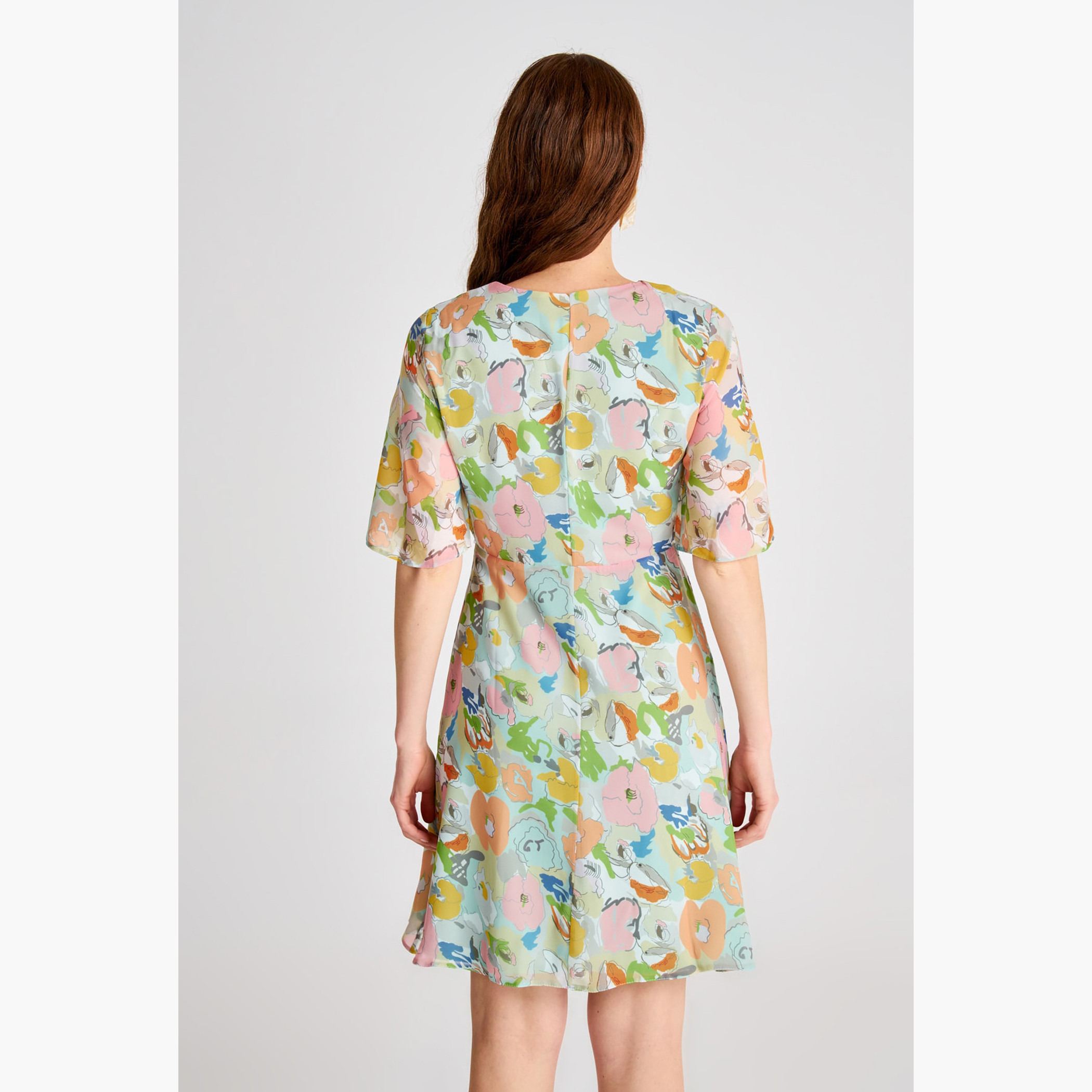 فستان قصير واسع بياقة V وأكمام قصيرة و طبعات أزهار من ترينديول-women-clothing-dresses-image-4