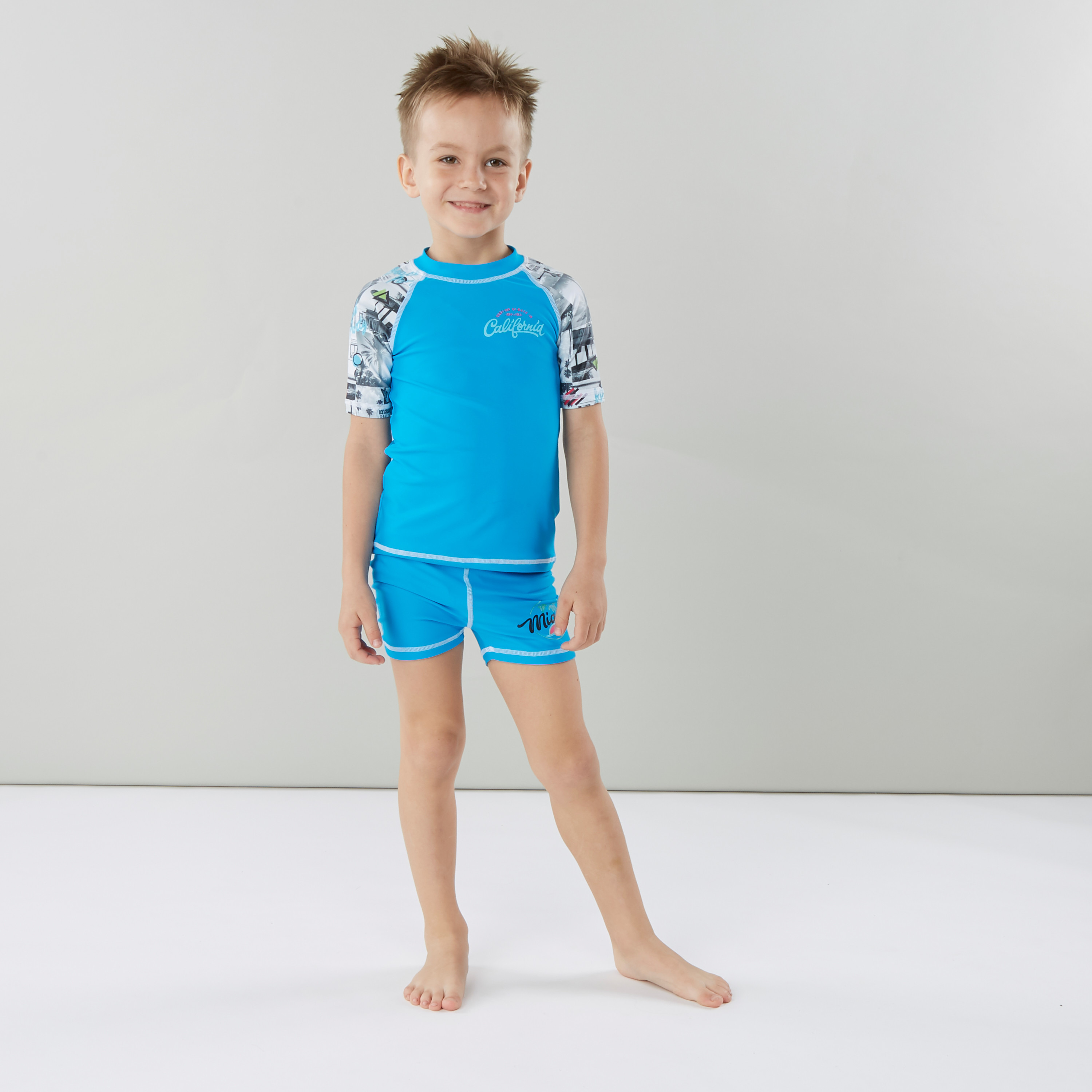 ملابس سباحة شورت و تيشيرت بأكمام مغايرة وطبعات من جونيورز-boys-clothing-sportswear-swimwear-image-1