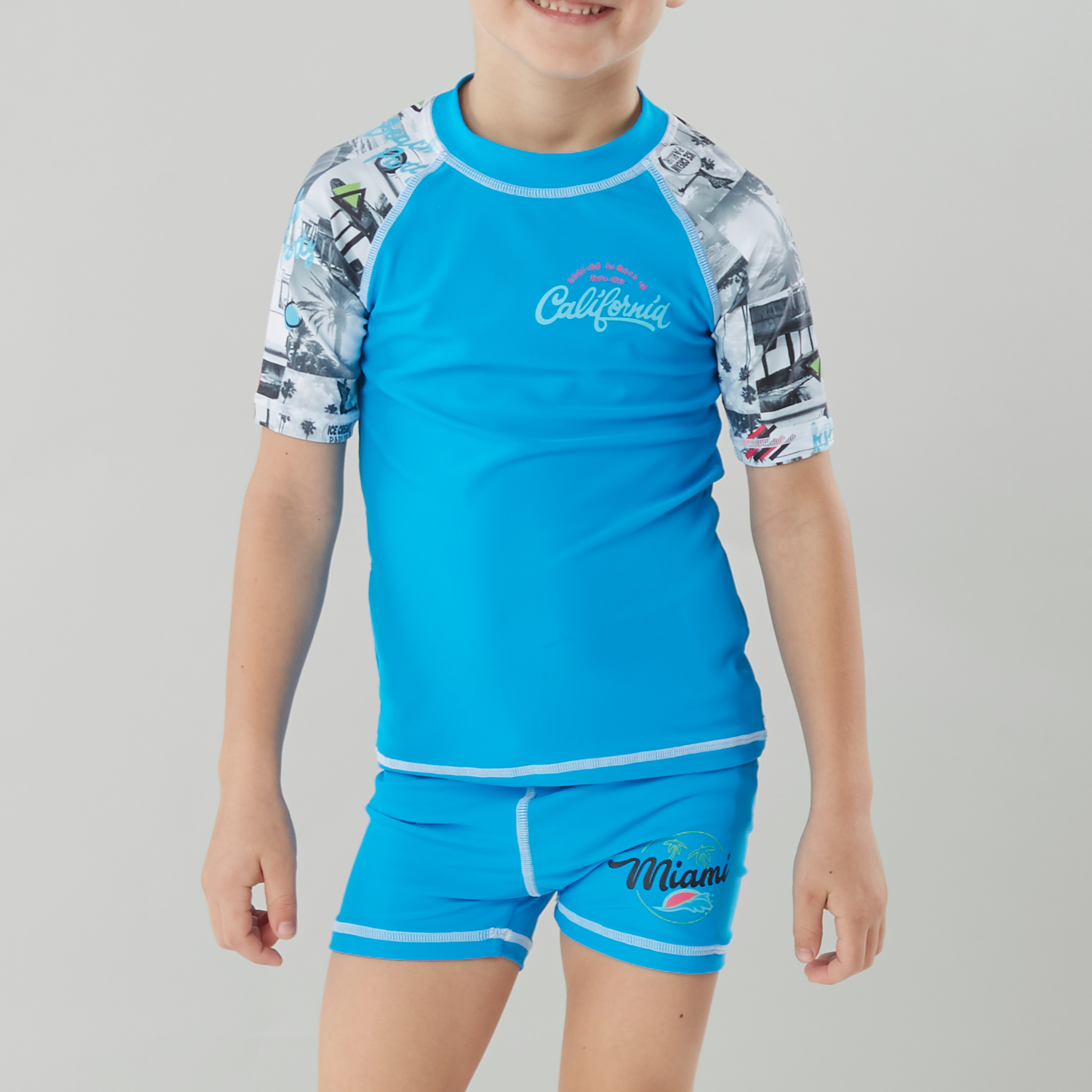 ملابس سباحة شورت و تيشيرت بأكمام مغايرة وطبعات من جونيورز-boys-clothing-sportswear-swimwear-image-2
