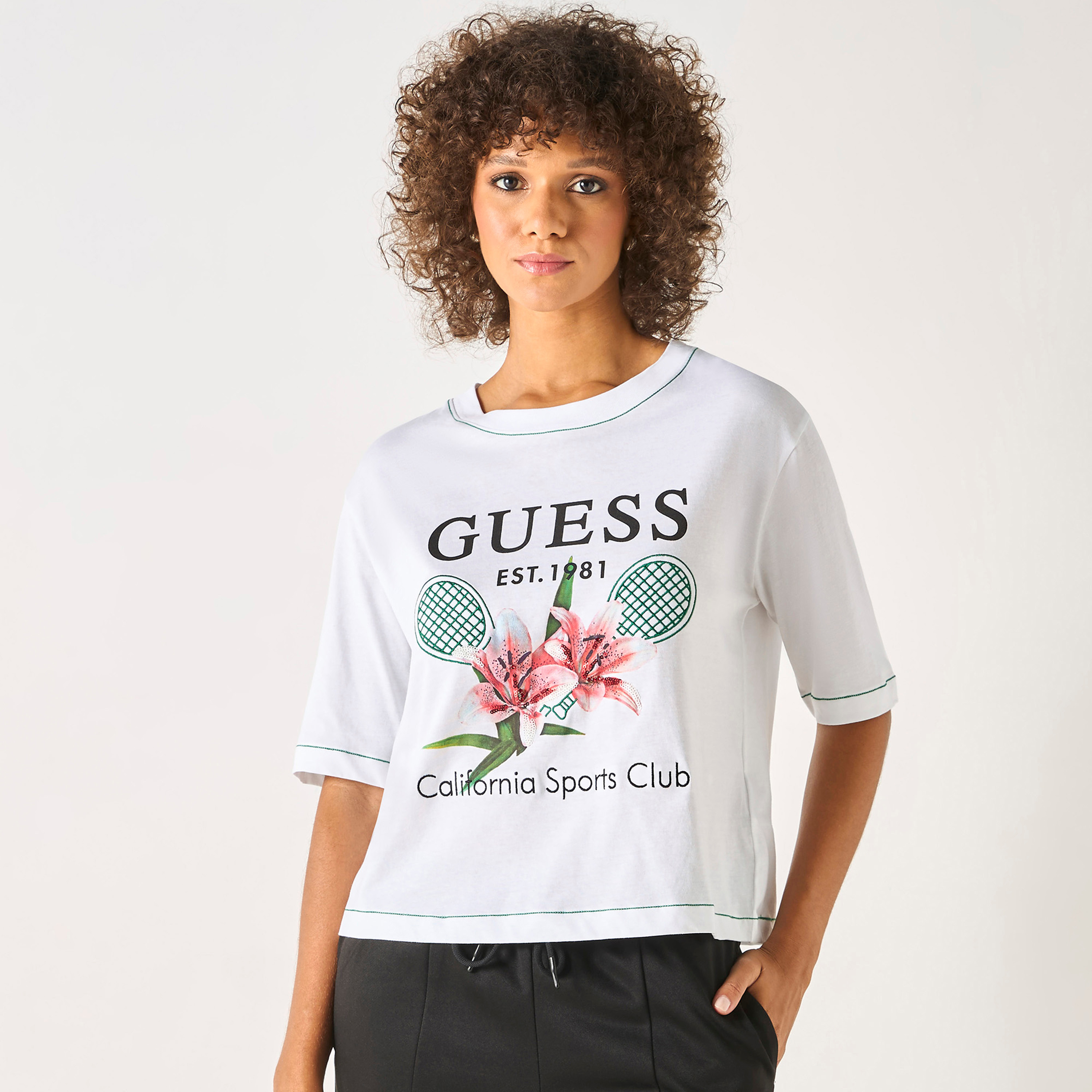 Buy Women s Guess Printed Round Neck T shirt with Short Sleeves Online Centrepoint UAE