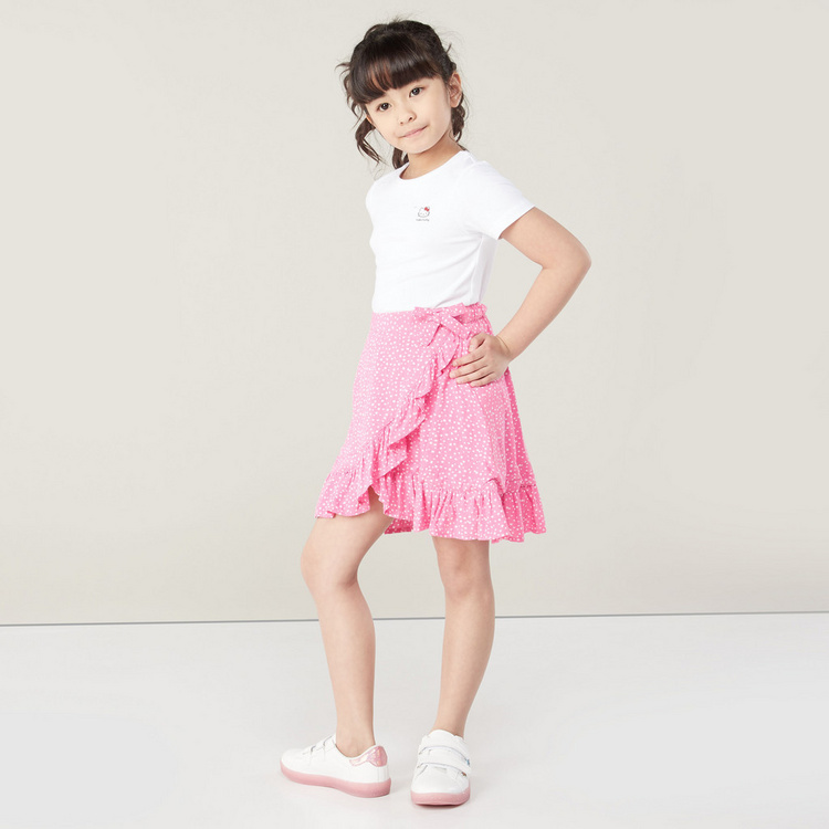 Juniors Printed Skirt with Ruffle Detail and Bow Applique