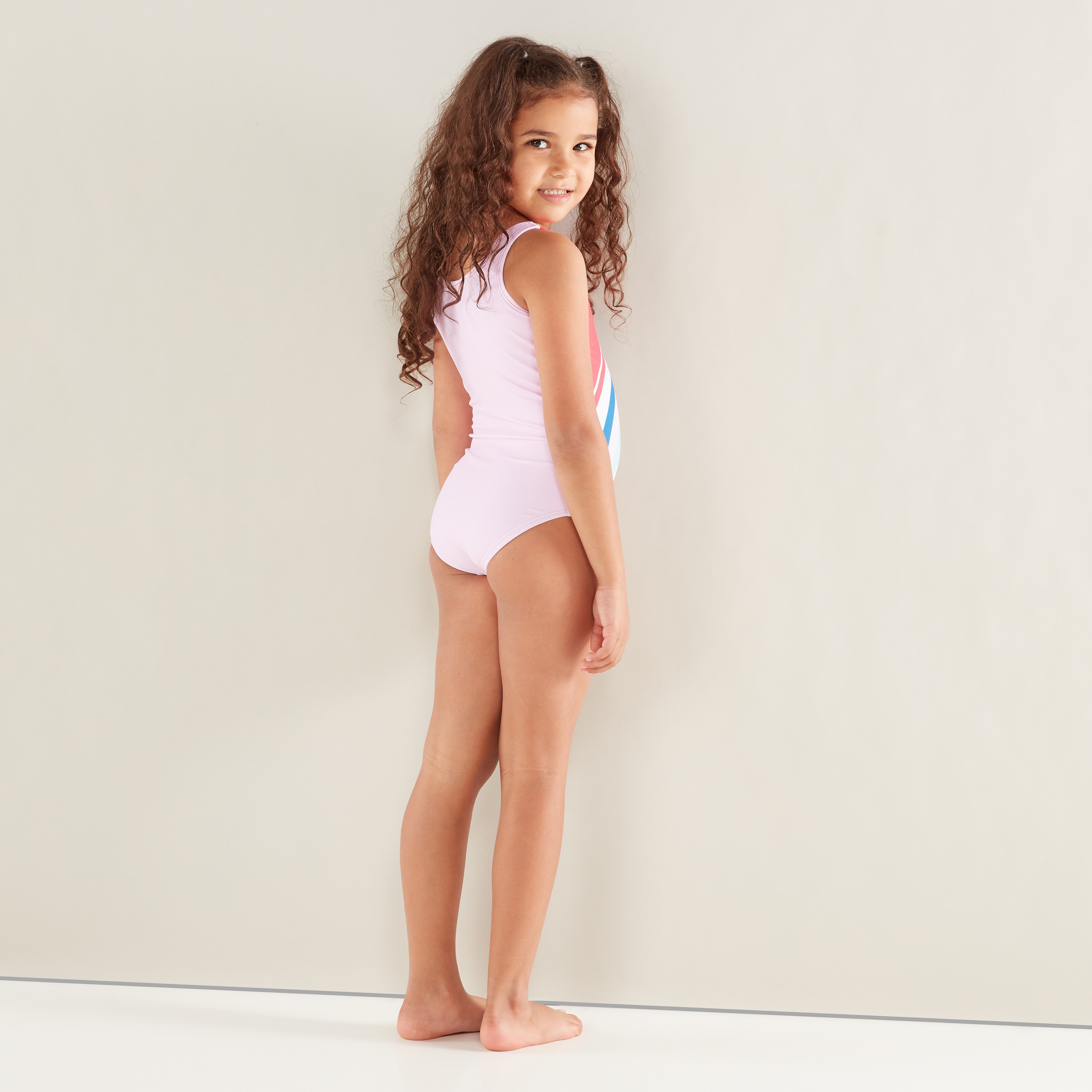 Little girls in store tight bathing suits