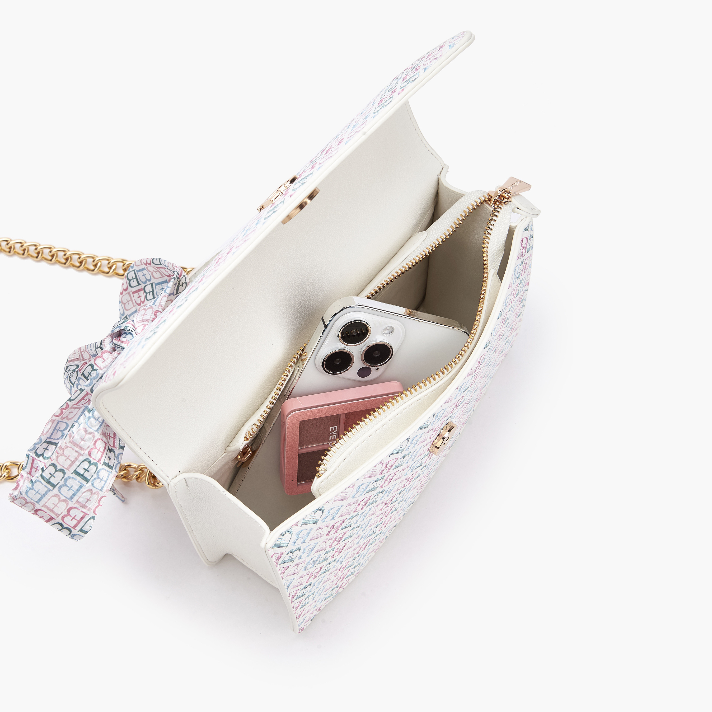 شنطة كروس بودي بطبعات مونوجرام وزينة وشاح من فلورا بيلا-women-bagsandwallets-handbags-image-8