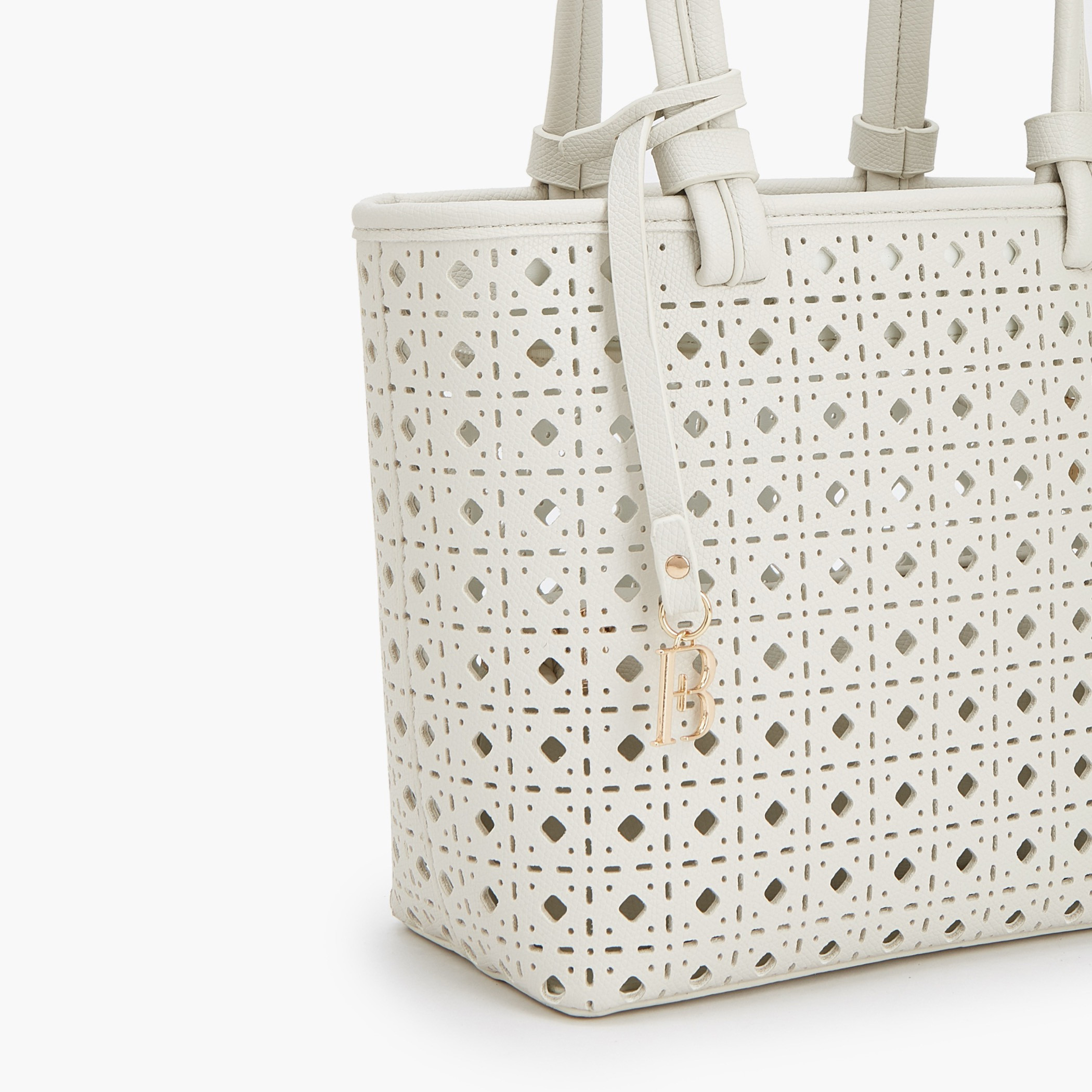 شنطة توتي بتصاميم مفرغة بالليزر مع شنطة كروس بودي من فلورا بيلا-women-bagsandwallets-handbags-image-7