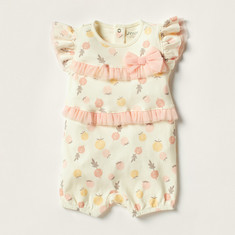 Juniors All Over Print Romper with Short Sleeves and Bow Detail