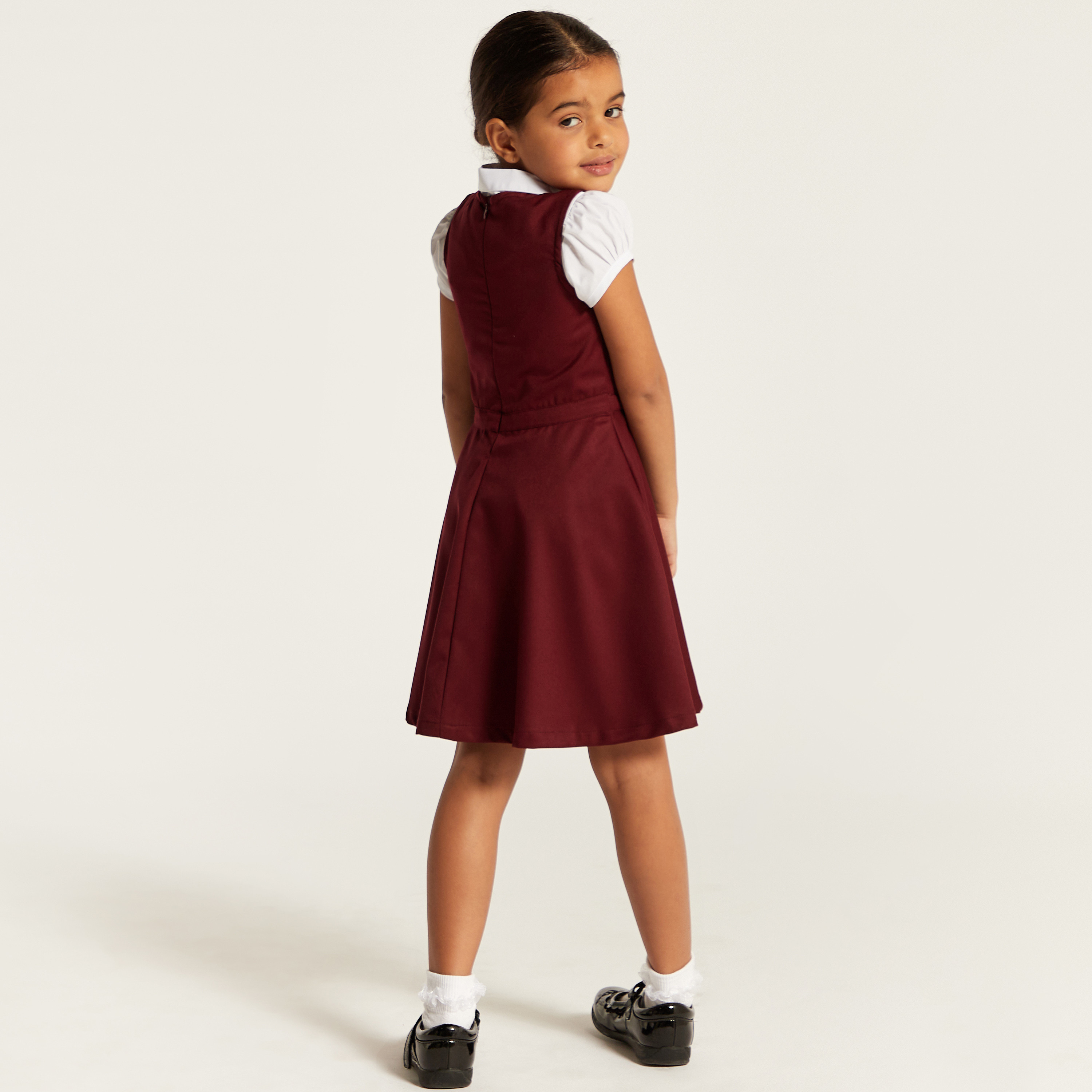 Buy Juniors Solid Pinafore with Bow Accent Online | Babyshop UAE