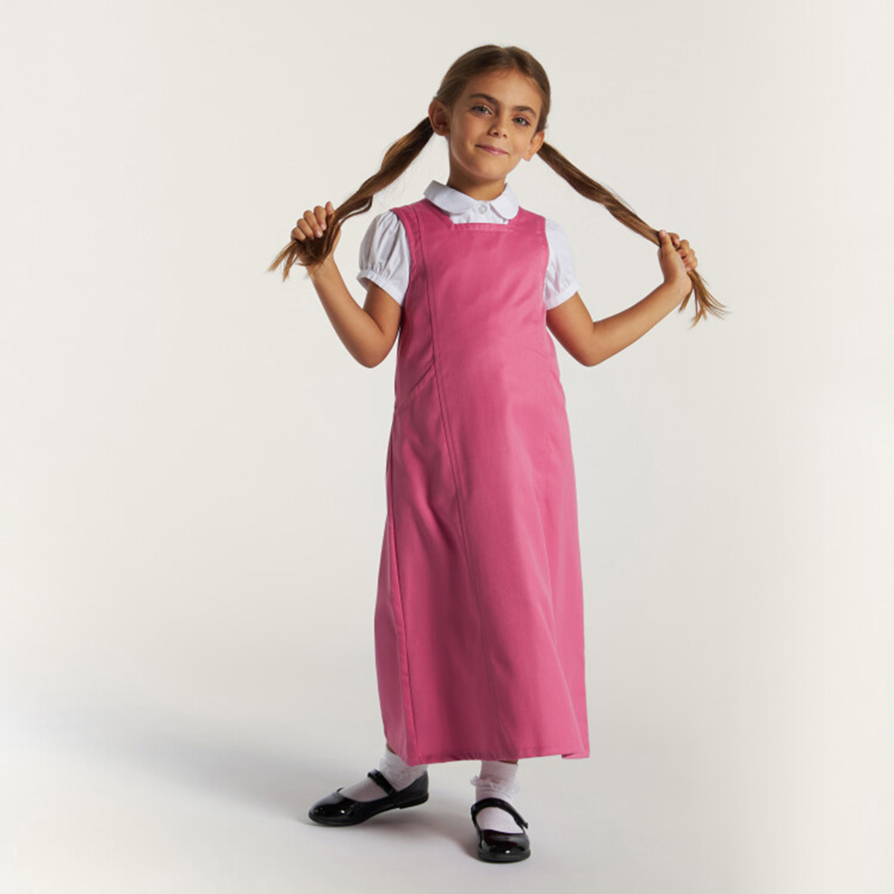 Buy Juniors Solid Pinafore Dress with Pocket and Tie Up Belt Online for Girls Centrepoint Oman